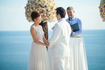 Couple exchanging vows at a Phuket wedding with Peter Notley