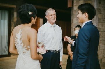 Peter Notley with a wedding couple at their Phuket ceremony