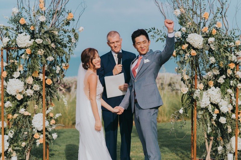 Newly married couple celebrating with Phuket wedding celebrant Peter Notley