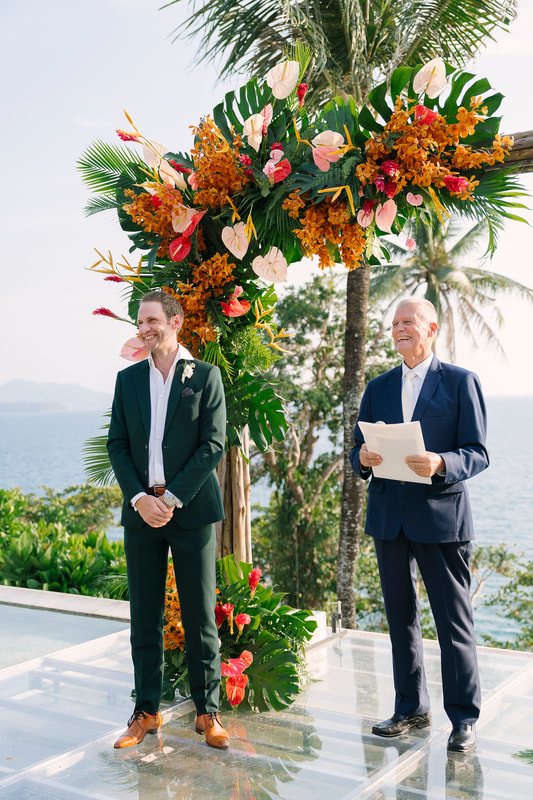 Peter Notley with a groom at an outdoor wedding ceremony in Phuket